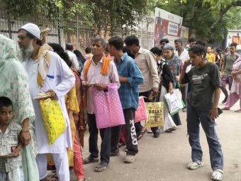 People Waiting for Food Distribution