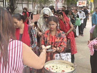 Volunteers Distributing Cooked Meals